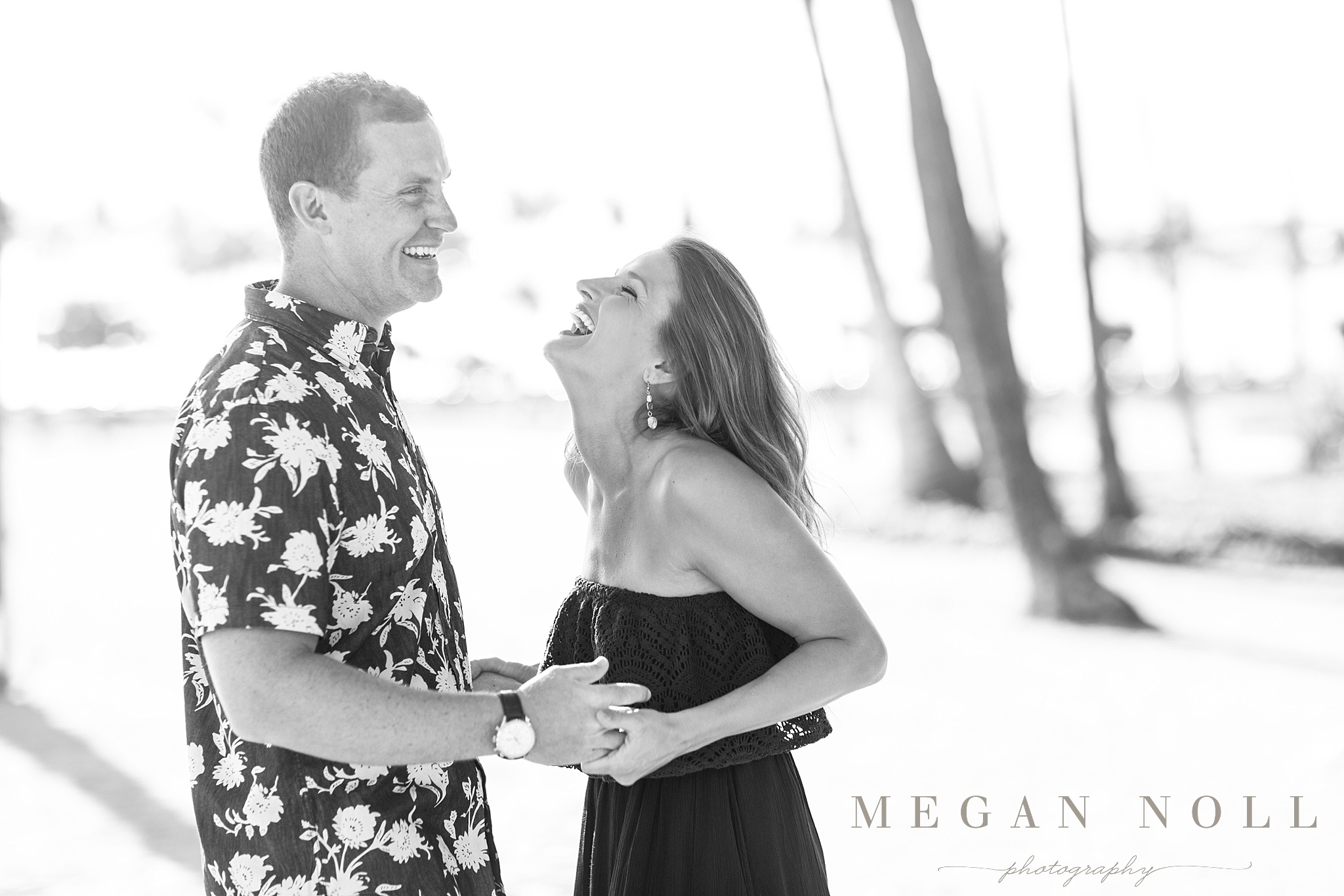 Kevin Huber, Mindi Huber, Hawaii Engagement Session, Guy and Girl Laughing, Black and White, Wedding Planning Tips You Might Not Have Considered