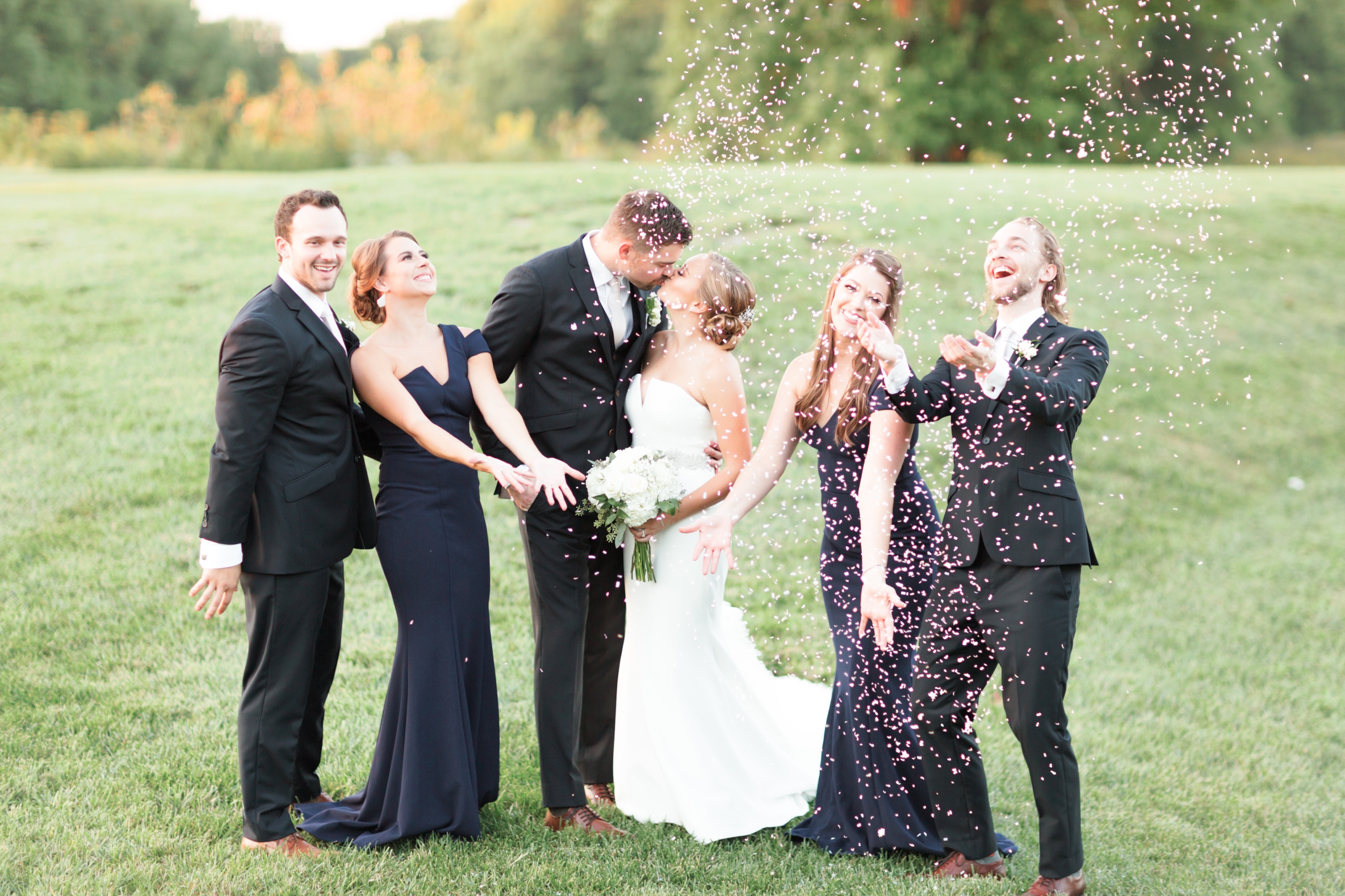 Bridal Party Throwing Confetti