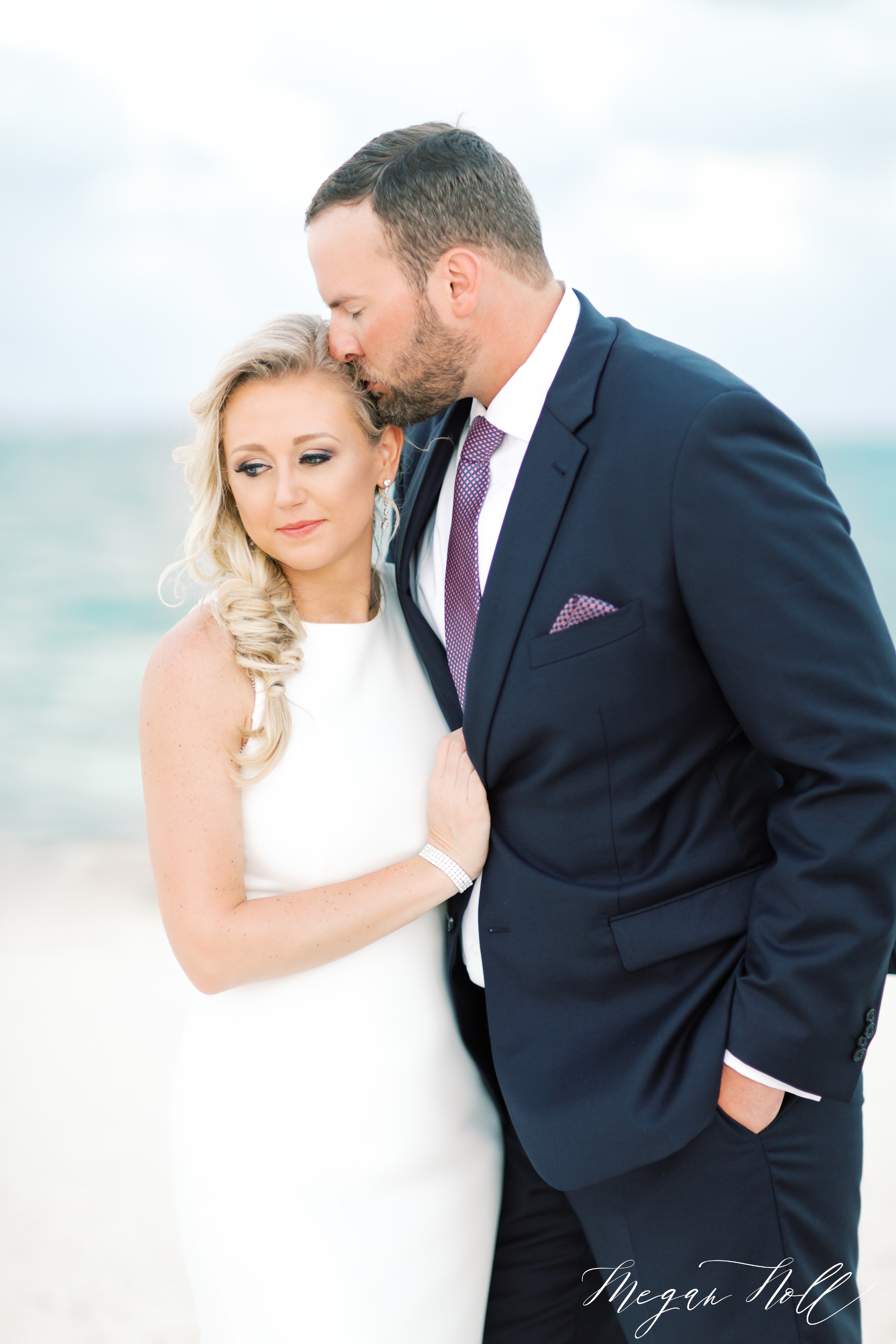 Portraits at the beach of Bride and Groom at sunset in Cancun Wedding