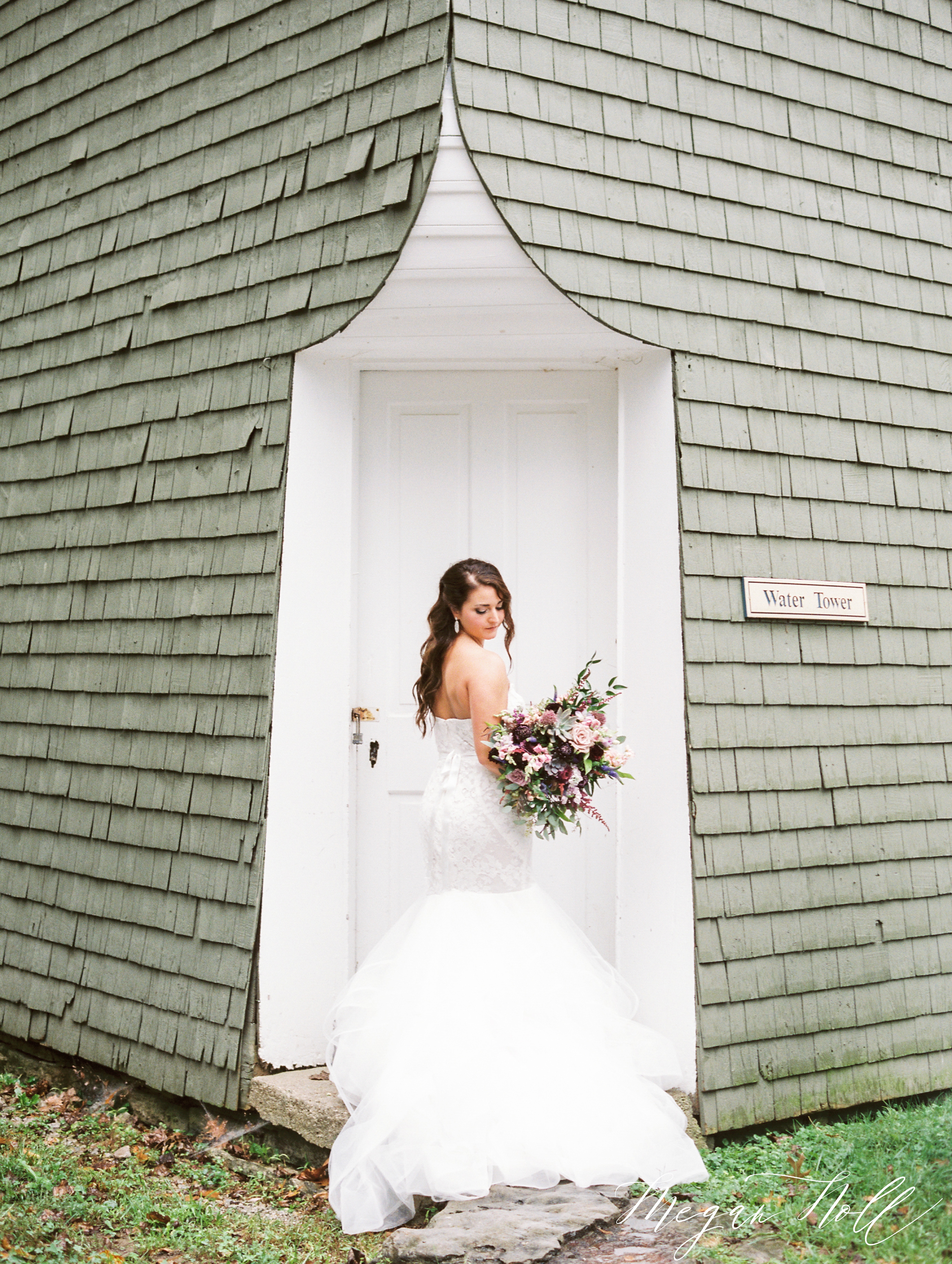 Bride holding flowers by Marti Heard Designs at Wedding at Cincinnati Nature Center