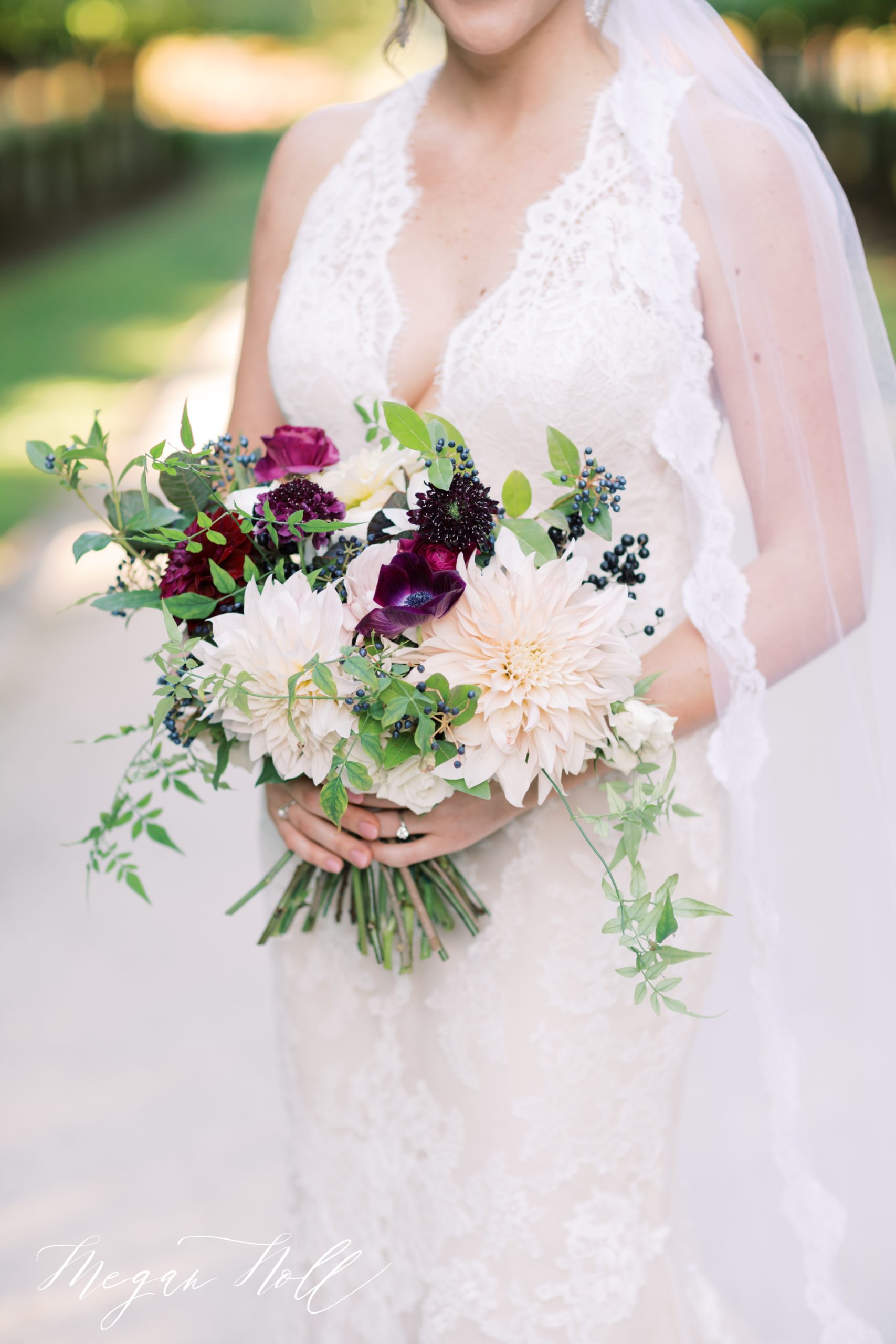 Beautiful bridal bouquet by Daisy Stone Studio with burdgendy