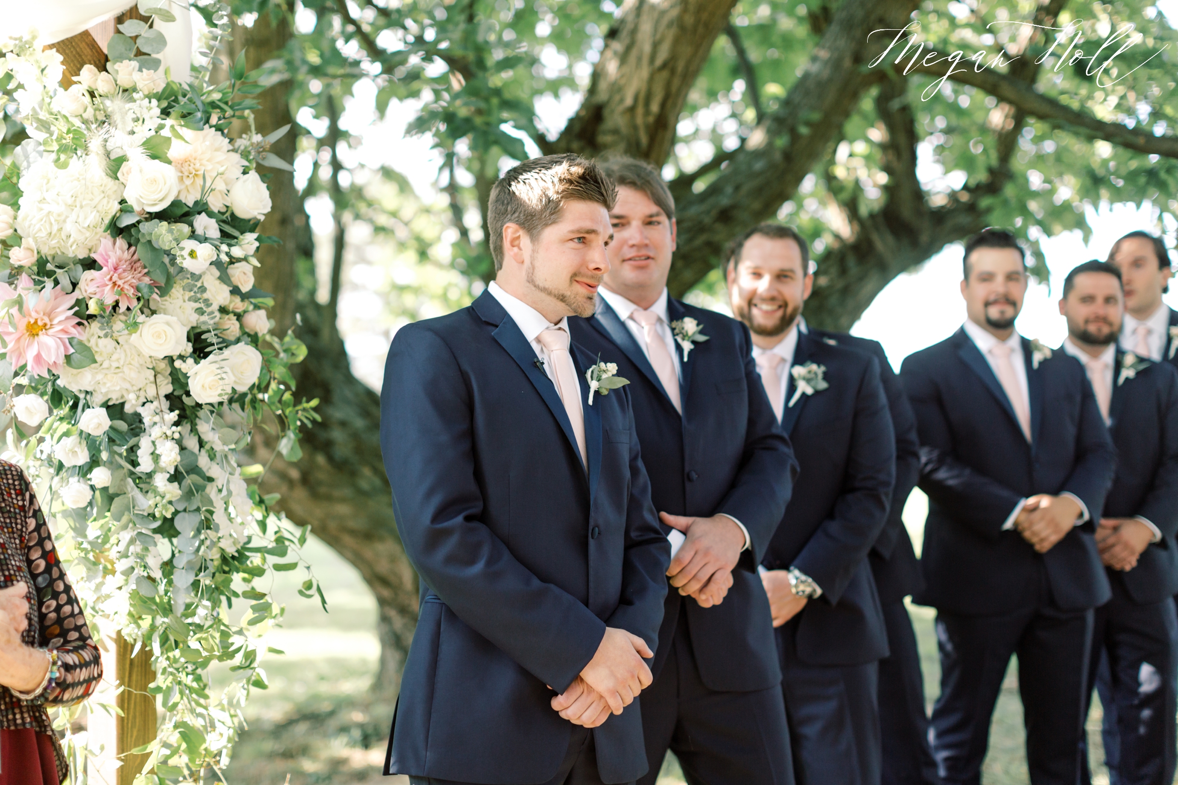Groom reaction to bride walking down the aisle
