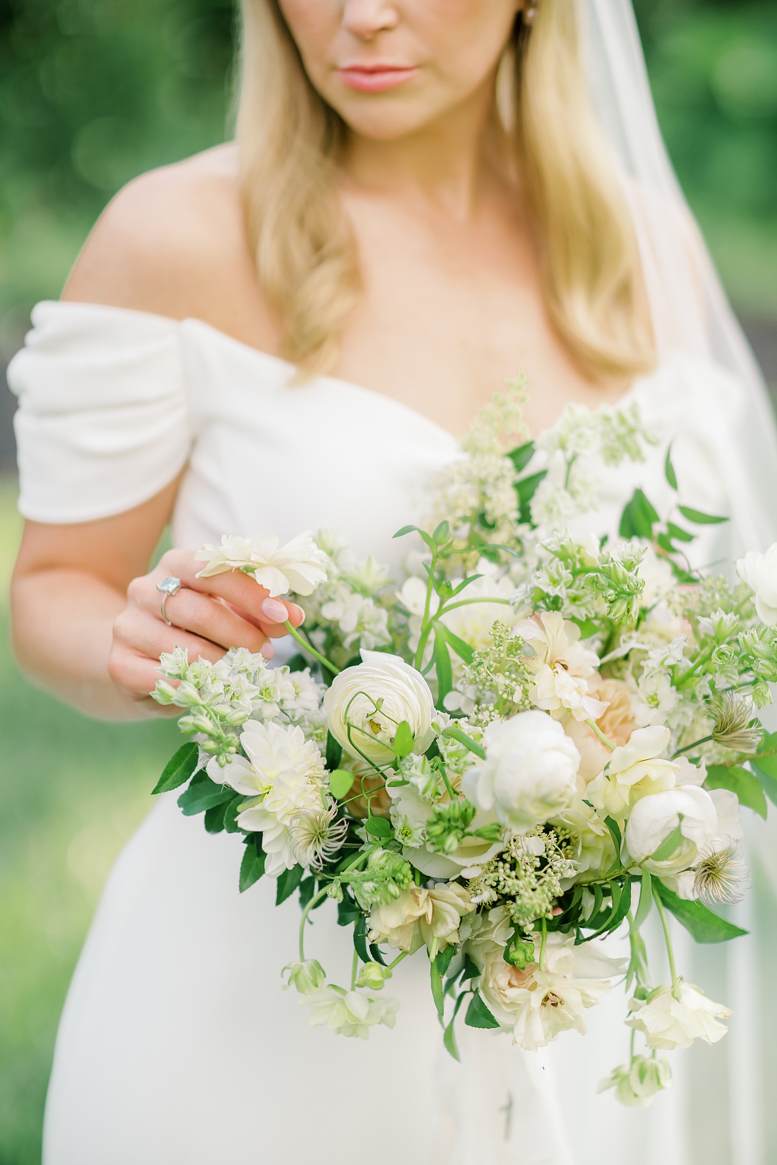 Bridal Bouquet with white flowers by The Budding Florist in Cincinnati