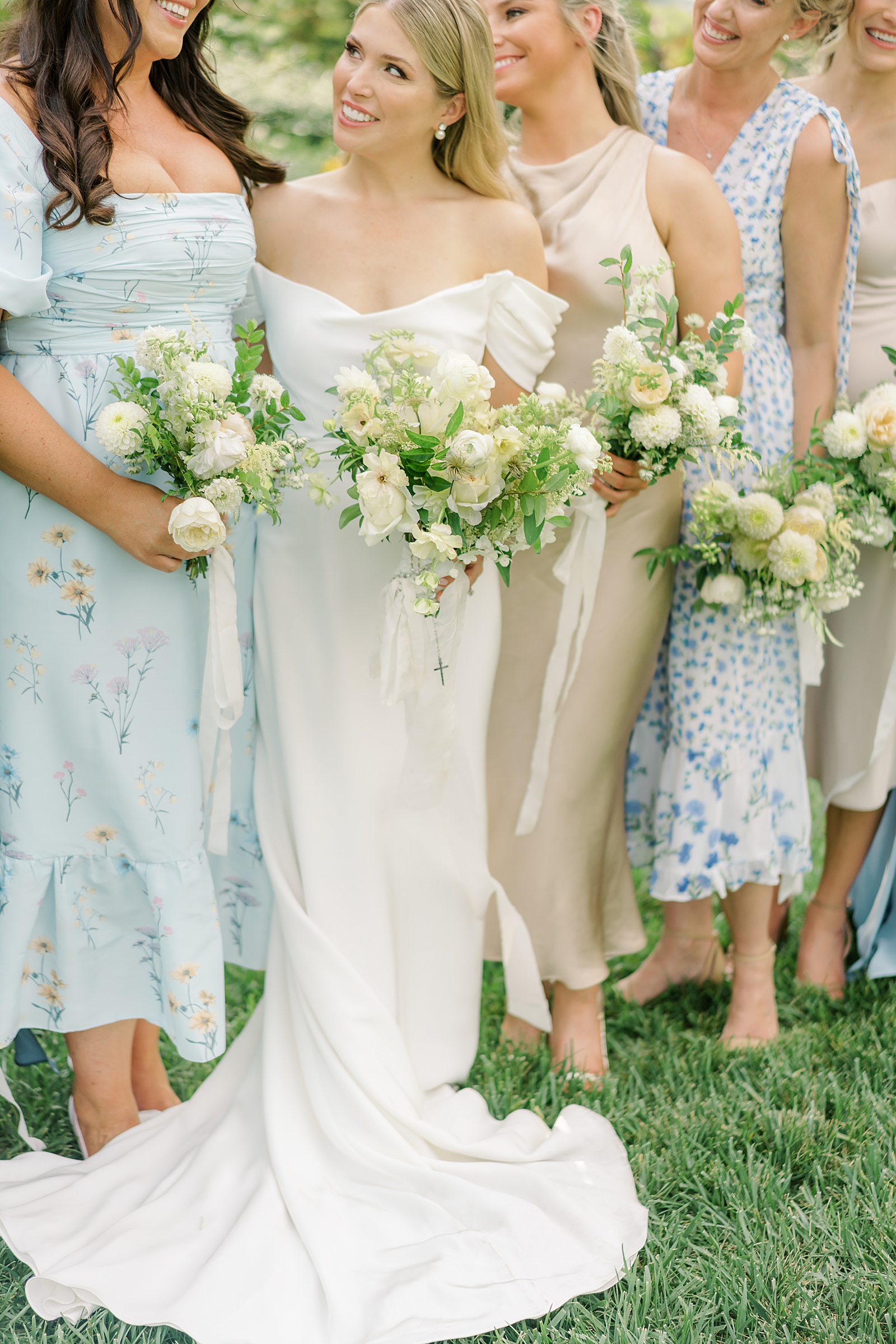 White bridesmaids bouquets by Ellie from The Budding Florist