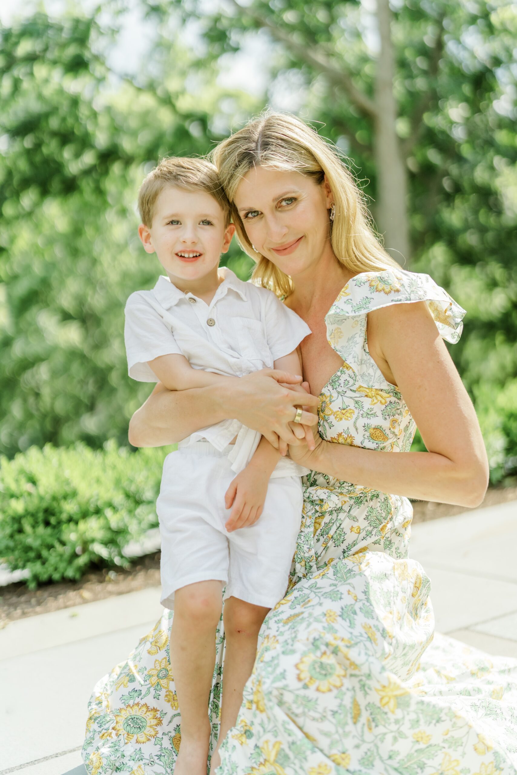 Mother and son both smile during at-home family photos