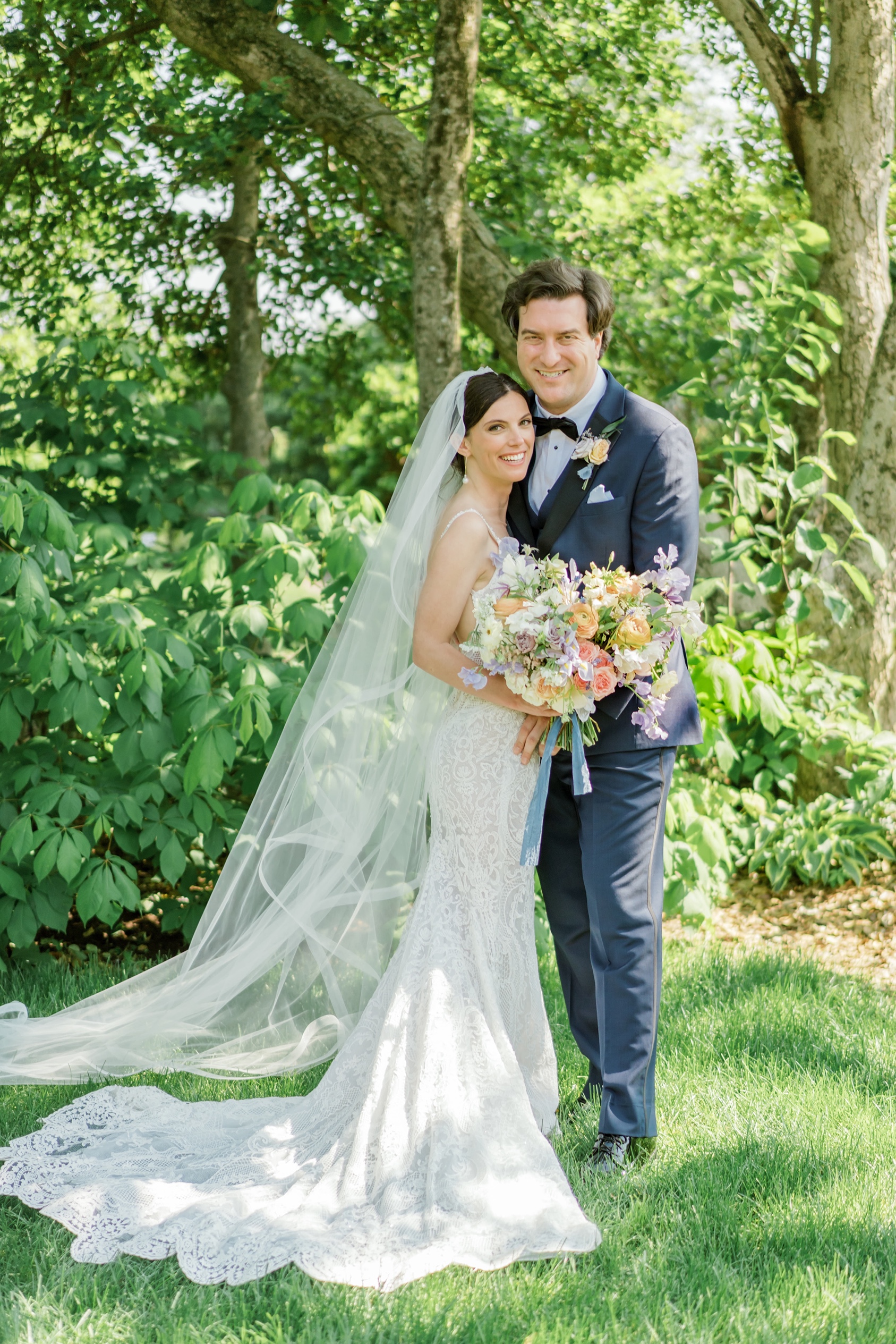 Bride and groom smile at Yew Dell Botanical Gardens wedding