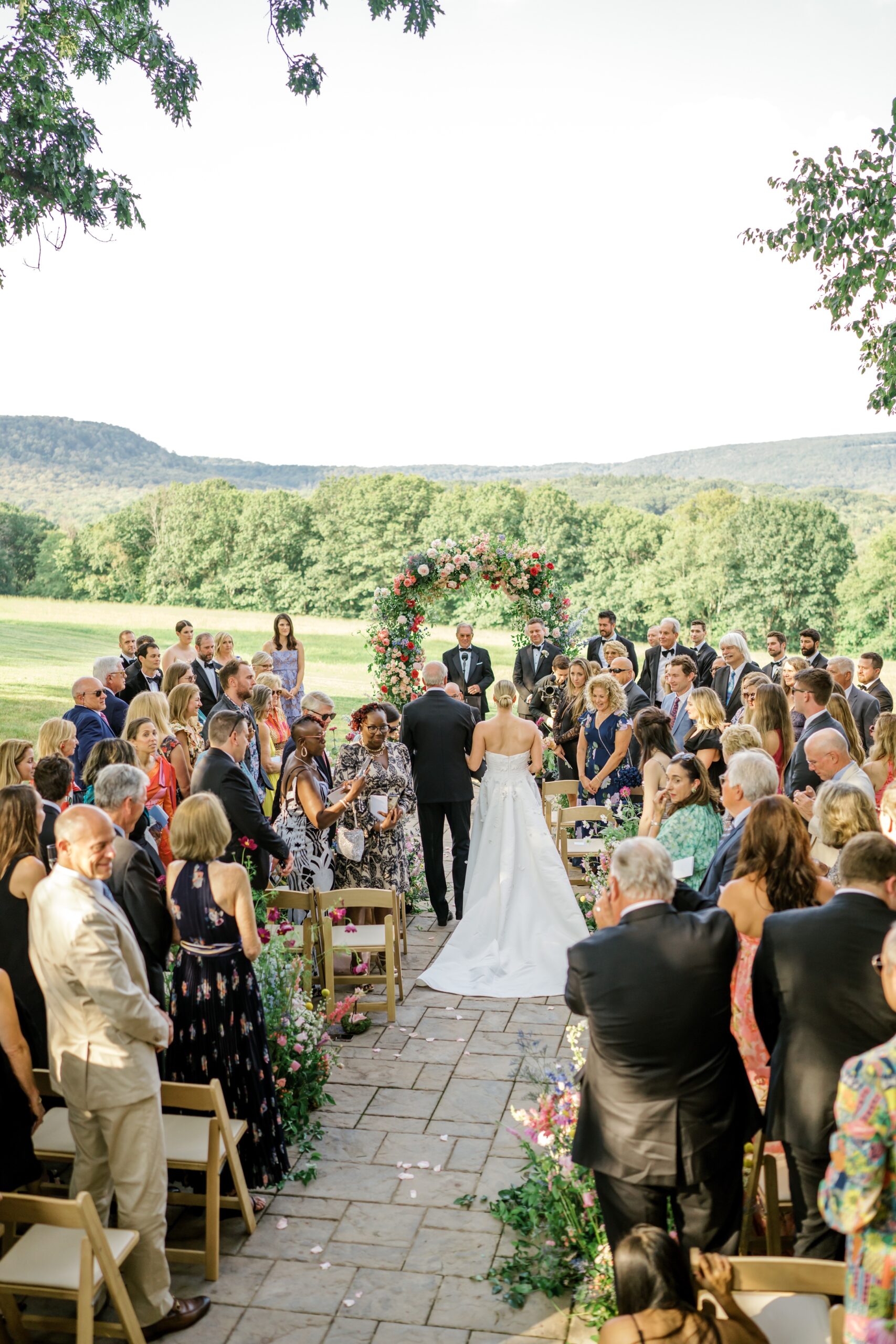 Bride walks down the aisle with father at Pocono Mountain wedding