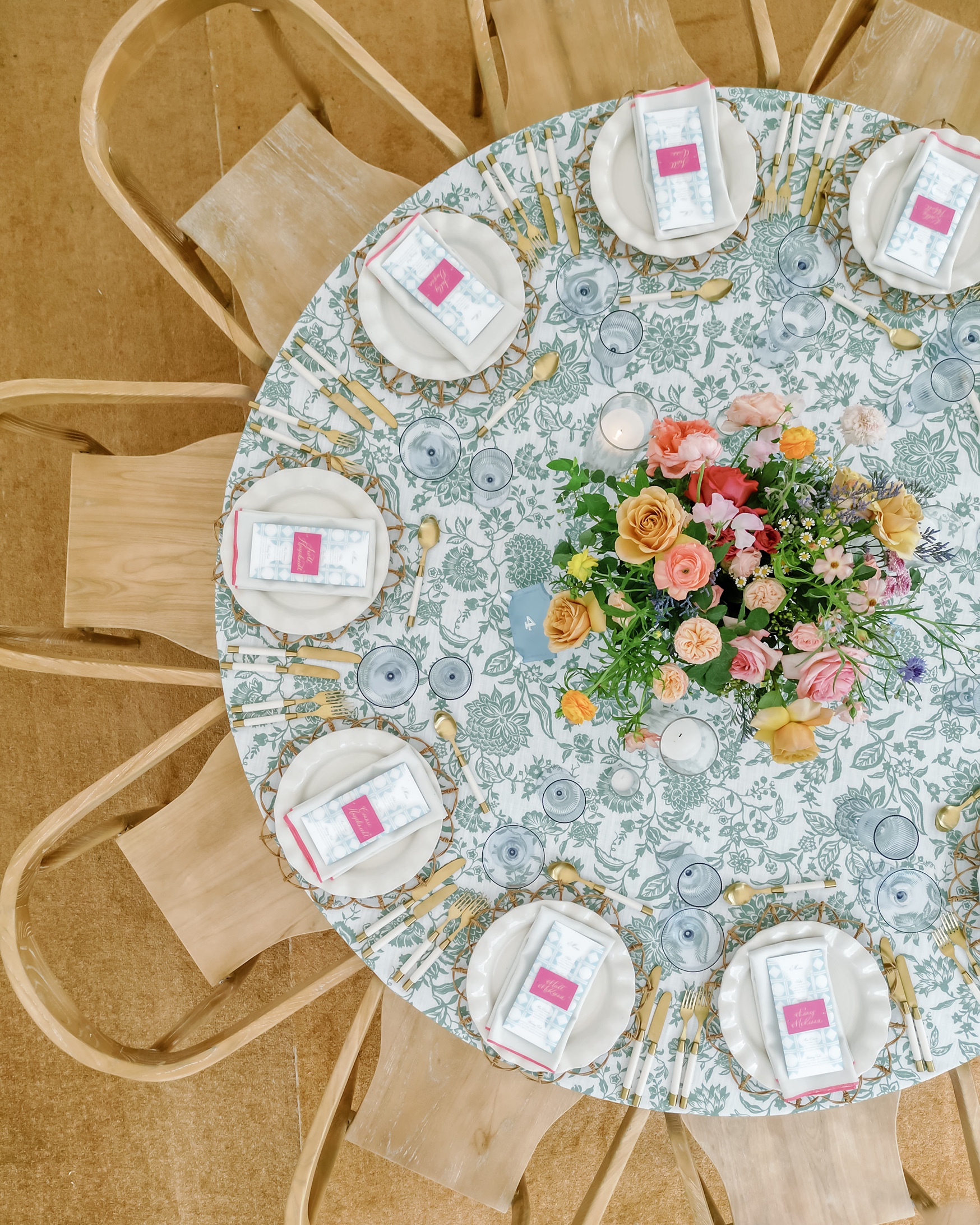 Patterned tablecloth at the tented wedding reception