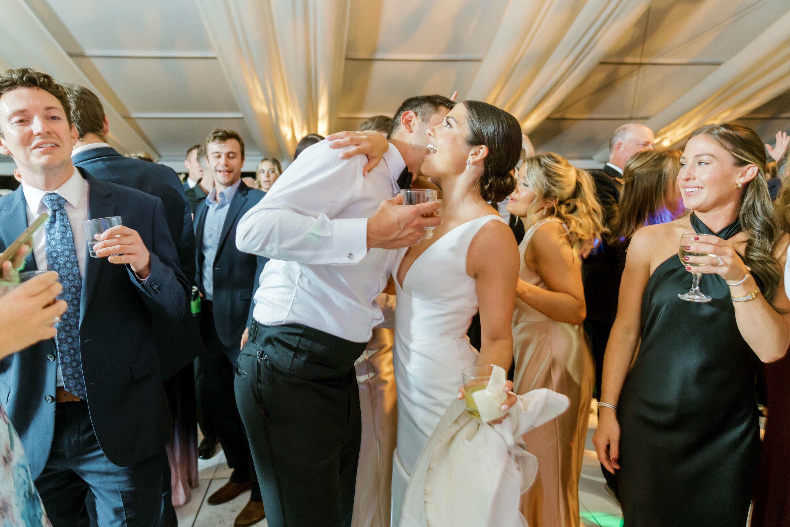 Groom kisses bride on cheek at the Greenacres wedding in Cincinnati
